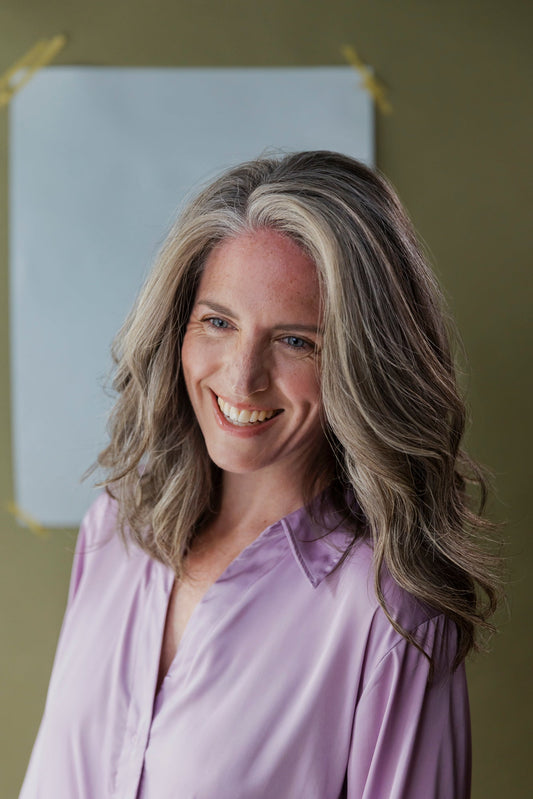 Woman with softly covered grey hair after using H2O Water Colour water-based hair colour